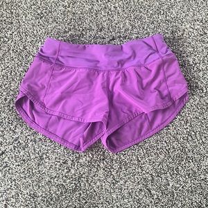 Lululemon vivid plum speed up shoets size 0 great condition